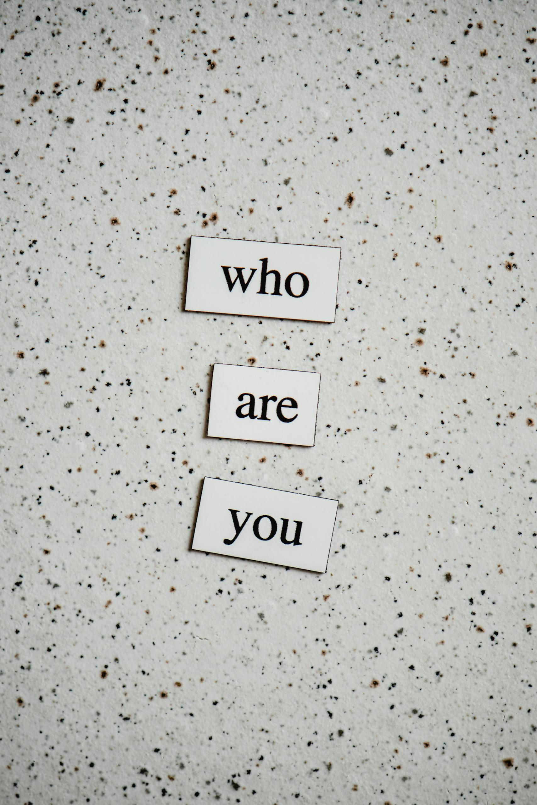 Artistic words arranged on a speckled surface. Perfect for motivational content.